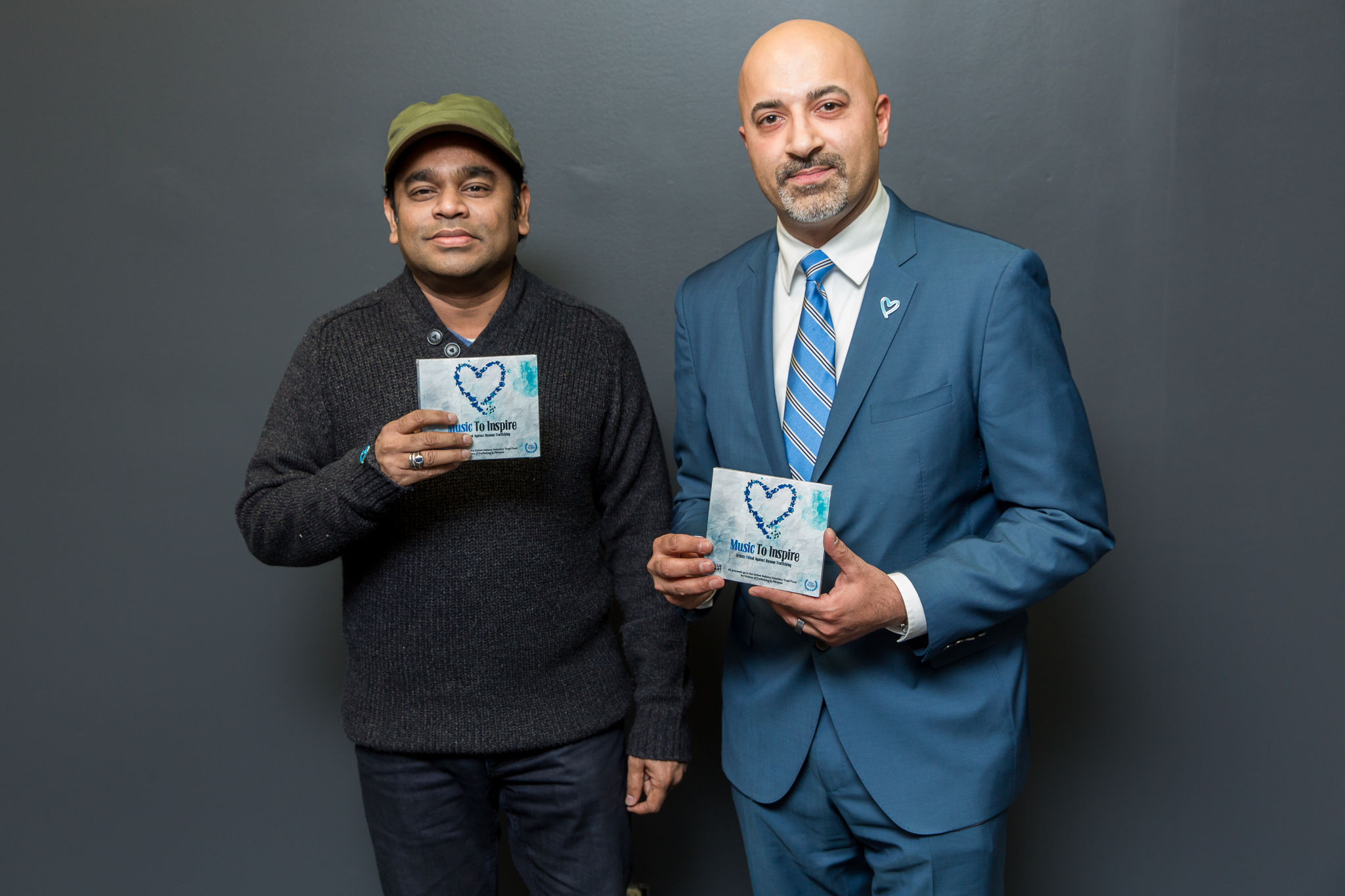 A.R. Rahman and Sammy Chand holding the Music To Inspire album